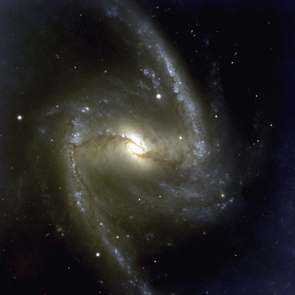NGC 1365 looks like a galaxy in the Hubble Deep Field North